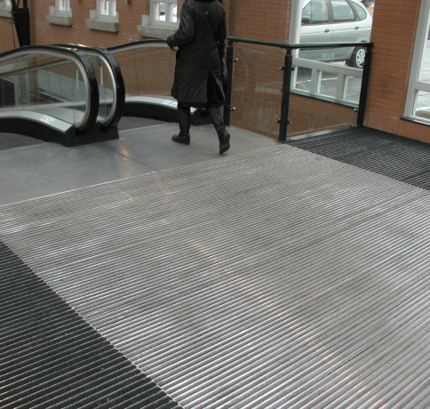 Axess Group Tireguard entrance mat on electric stairs.